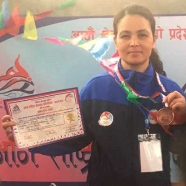 एनआरएनए मकाउकी अध्यक्ष अधिकारीलाई काँश्यपदक